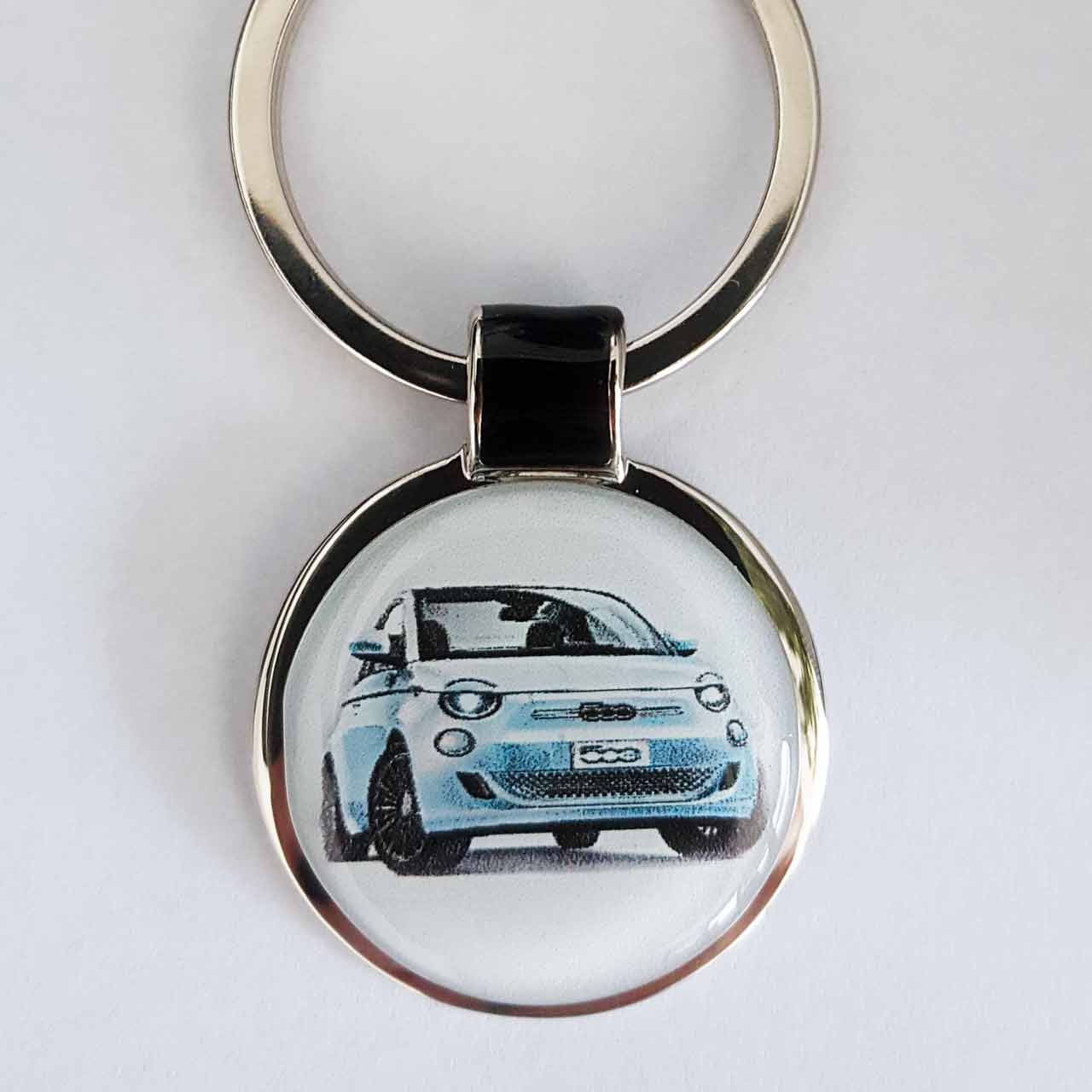 https://www.shop-fotogravur.de/media/image/8b/4f/2e/fiat_500e_farbe_gravur_schluesselanhanger_personalisiert.jpg